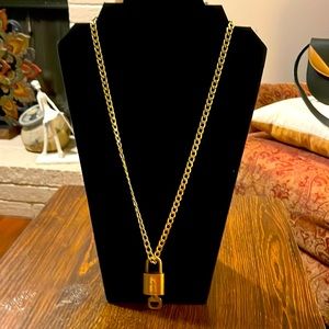 Authentic Louis Vuitton, lock and key on unbranded chain